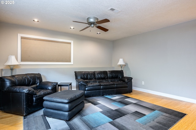11782 SE 108th Ave, Happy Valley, OR 97086 - living area featuring a ceiling fan, wood finished floors, recessed lighting, and a textured ceiling