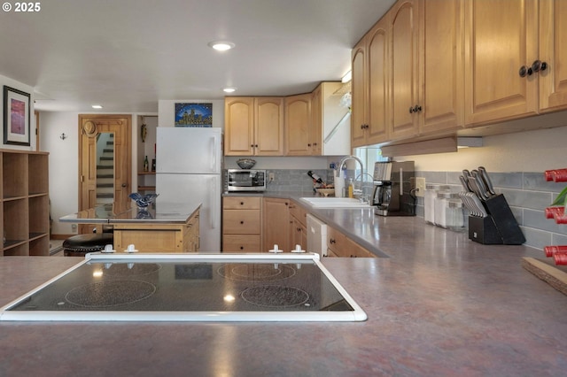 429 N Bridgeton Rd # 15, Portland, OR 97217 - kitchen featuring white appliances, light brown cabinetry, and recessed lighting