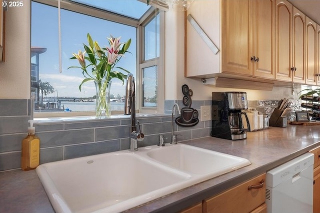 429 N Bridgeton Rd # 15, Portland, OR 97217 - kitchen featuring dishwasher, healthy amount of natural light, and light brown cabinets