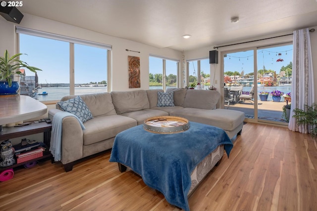429 N Bridgeton Rd # 15, Portland, OR 97217 - living room with a water view, light wood-type flooring, and recessed lighting
