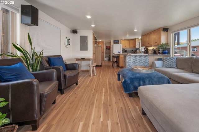 429 N Bridgeton Rd # 15, Portland, OR 97217 - living area featuring light wood-style flooring, recessed lighting, and electric panel