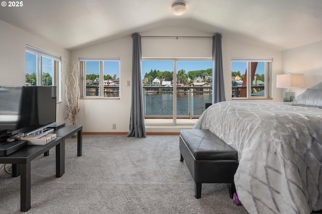 429 N Bridgeton Rd # 15, Portland, OR 97217 - bedroom featuring vaulted ceiling, carpet flooring, a water view, and access to exterior