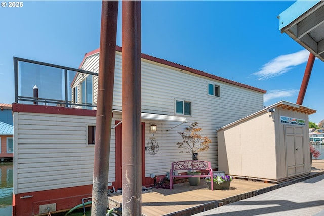 429 N Bridgeton Rd # 15, Portland, OR 97217 - view of patio with a shed and a deck