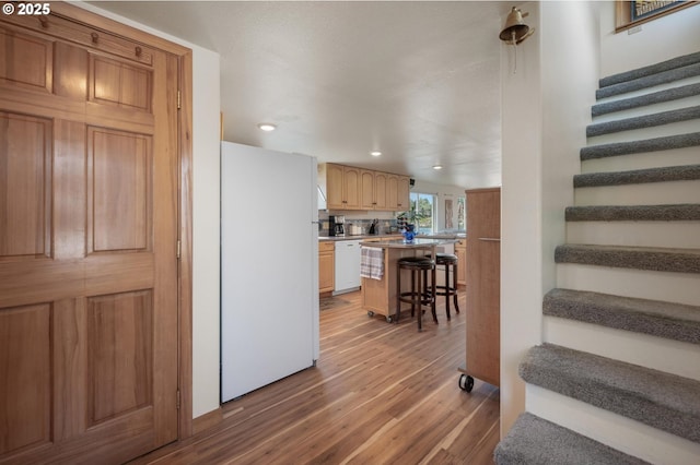 429 N Bridgeton Rd # 15, Portland, OR 97217 - stairway with wood finished floors and recessed lighting