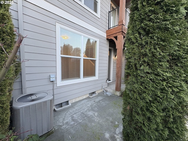 view of side of home with cooling unit