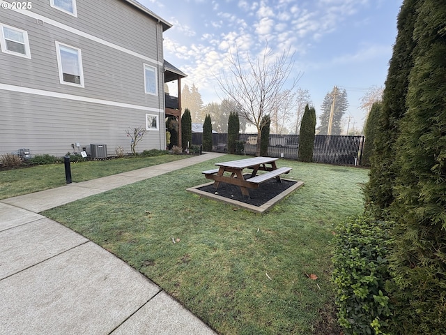 view of yard featuring central AC