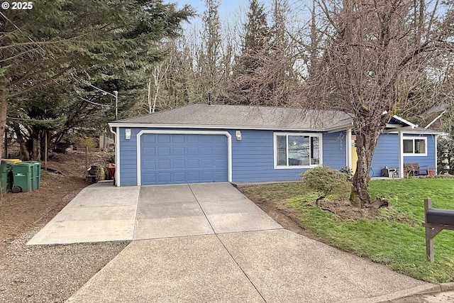 ranch-style house with a garage, driveway, roof with shingles, and a front yard