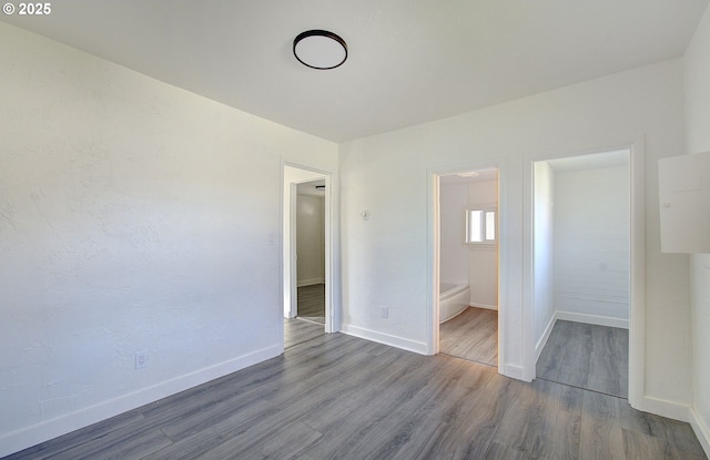 105 Redpath St, Kelso, WA 98626 - unfurnished bedroom with wood finished floors and baseboards
