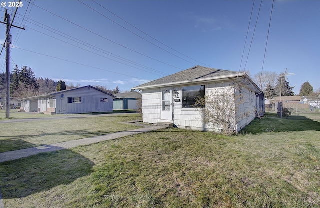 105 Redpath St, Kelso, WA 98626 - rear view of house featuring roof with shingles and crawl space