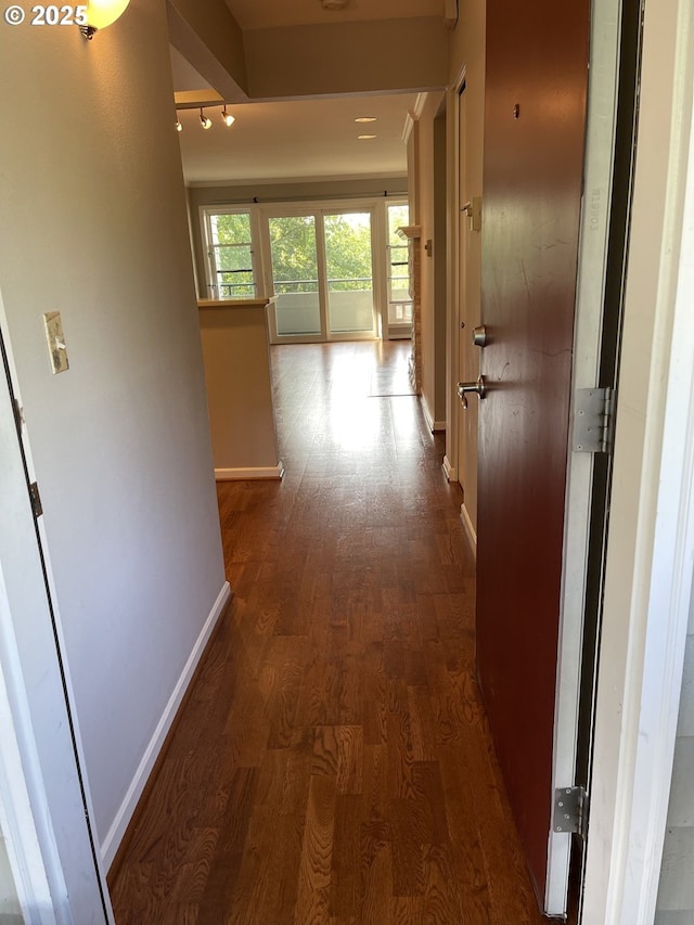 4970 S Landing Dr Unit 302, Portland, OR 97239 - hall featuring baseboards and wood finished floors