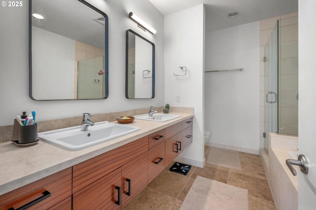 1634 NW Riverscape St, Portland, OR 97209 - full bath with double vanity, tiled shower, toilet, and a relaxing tiled tub