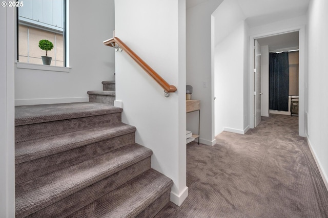 1634 NW Riverscape St, Portland, OR 97209 - staircase with carpet floors and baseboards