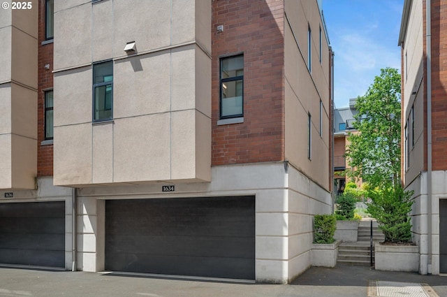 1634 NW Riverscape St, Portland, OR 97209 - view of property with an attached garage