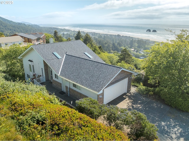 461 Home Ct, Rockaway Beach, OR 97136 - aerial view of property and surrounding area with a water and mountain view