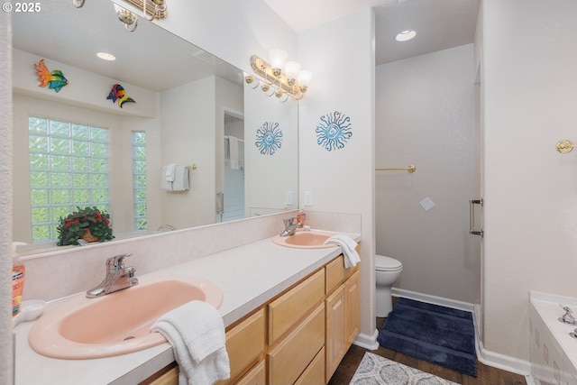 461 Home Ct, Rockaway Beach, OR 97136 - bathroom featuring double vanity, wood finished floors, a bath, and an enclosed shower