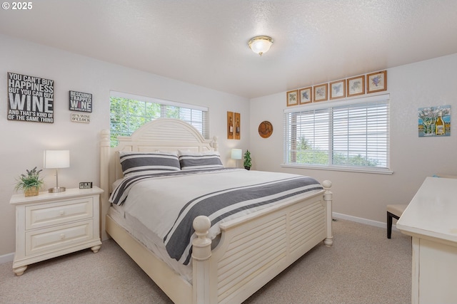 461 Home Ct, Rockaway Beach, OR 97136 - bedroom with light carpet and baseboards