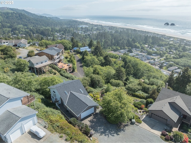 461 Home Ct, Rockaway Beach, OR 97136 - aerial perspective of suburban area with a forest and a large body of water