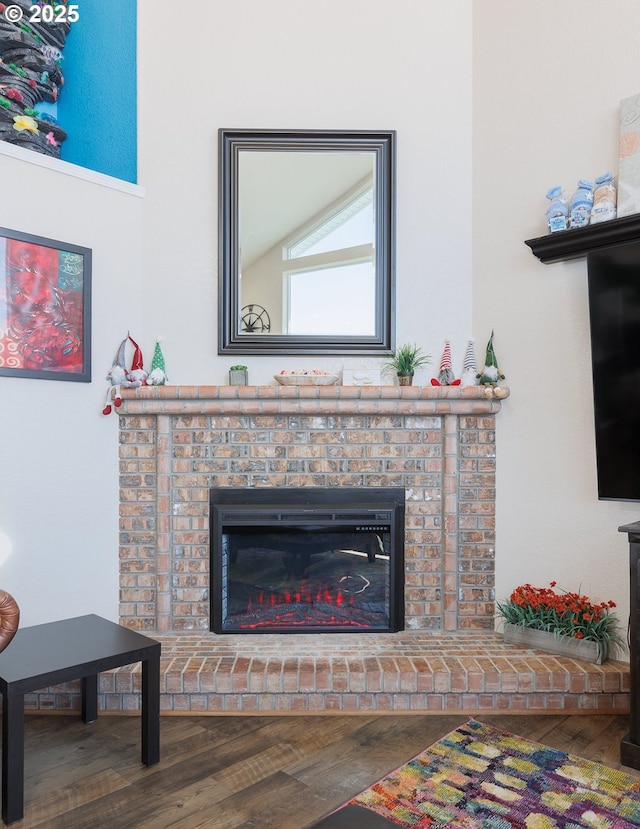 461 Home Ct, Rockaway Beach, OR 97136 - detailed view of a brick fireplace and wood finished floors