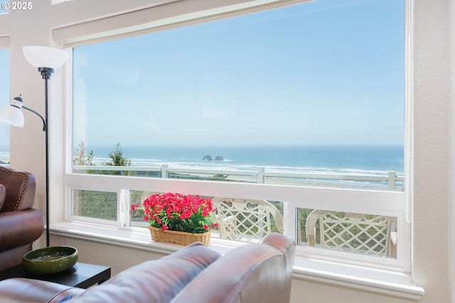 461 Home Ct, Rockaway Beach, OR 97136 - interior space featuring view of water and beach and healthy amount of natural light