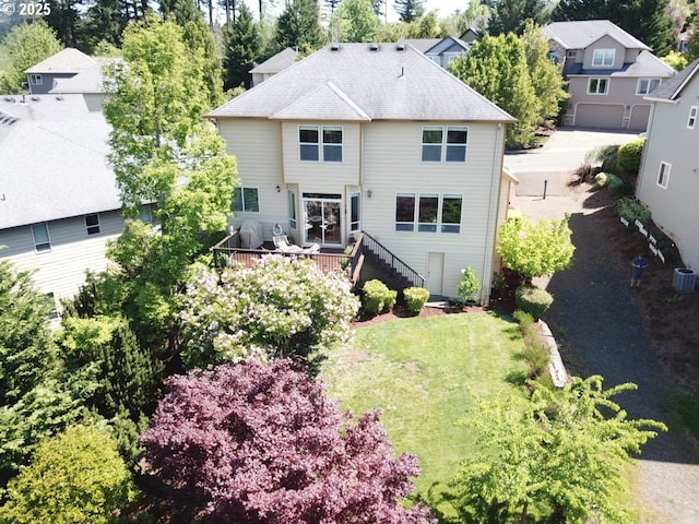 4119 Forest View Dr, Washougal, WA 98671 - back of house with a yard, central AC, stairway, and a wooden deck