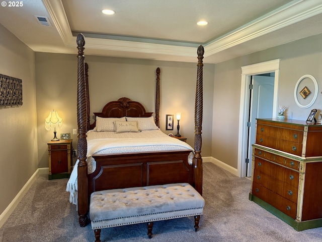 carpeted bedroom featuring baseboards, a tray ceiling, crown molding, and recessed lighting
