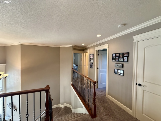 staircase with carpet, baseboards, recessed lighting, a textured ceiling, and ornamental molding
