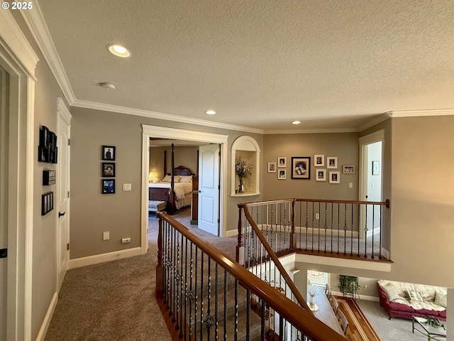 4119 Forest View Dr, Washougal, WA 98671 - corridor featuring an upstairs landing, carpet floors, baseboards, a textured ceiling, and crown molding