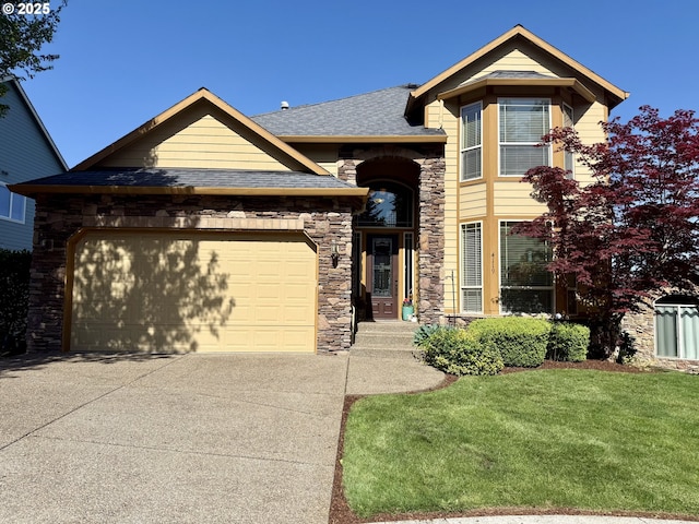 view of front of house with stone siding, driveway, an attached garage, roof with shingles, and a front yard
