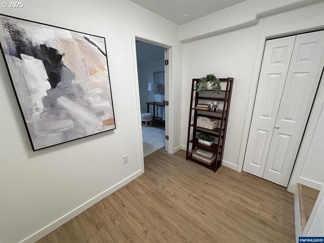 hall featuring light wood-type flooring