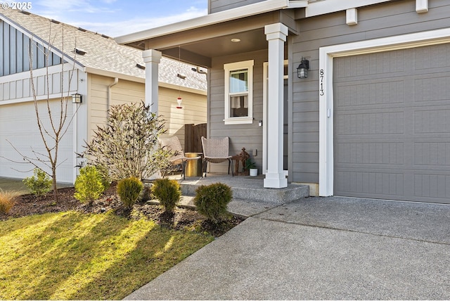 view of exterior entry featuring covered porch