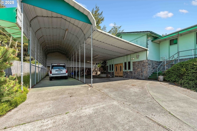 705 Prefontaine Dr, Coos Bay, OR 97420 - view of car parking with driveway, stairway, and a detached carport