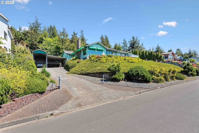 705 Prefontaine Dr, Coos Bay, OR 97420 - view of front of home featuring concrete driveway and a detached carport