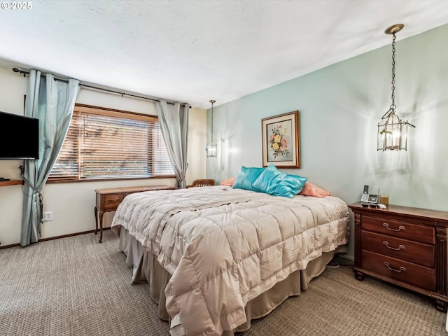 bedroom featuring light colored carpet