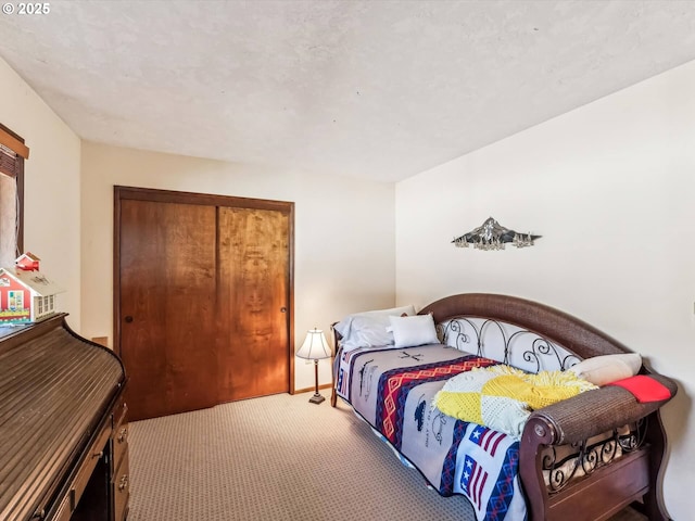 carpeted bedroom with a closet