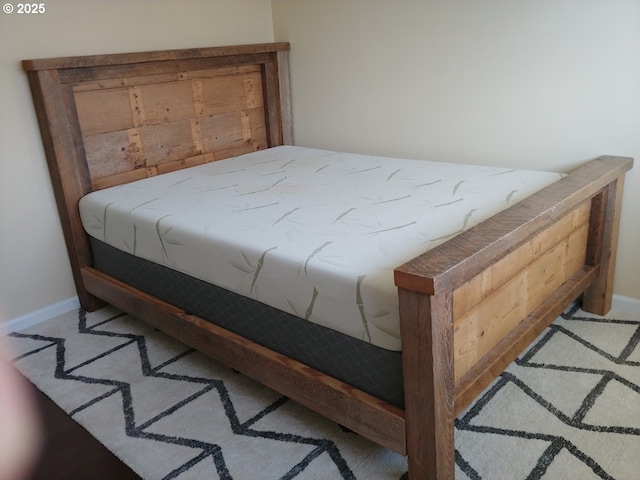 bedroom with baseboards