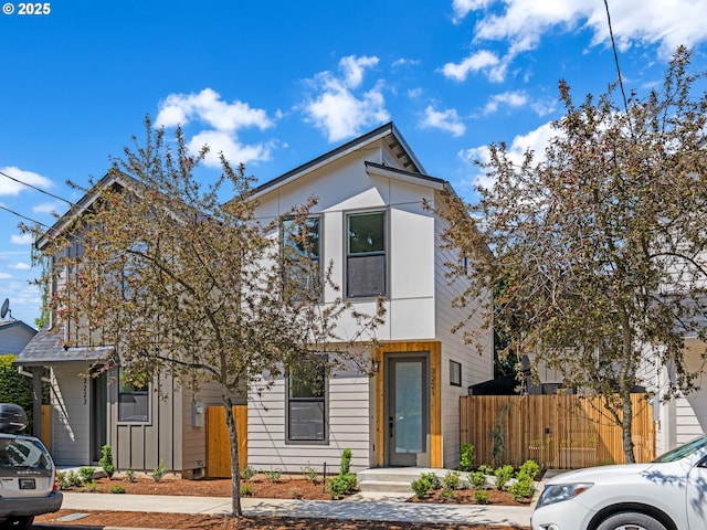 view of front of home with fence