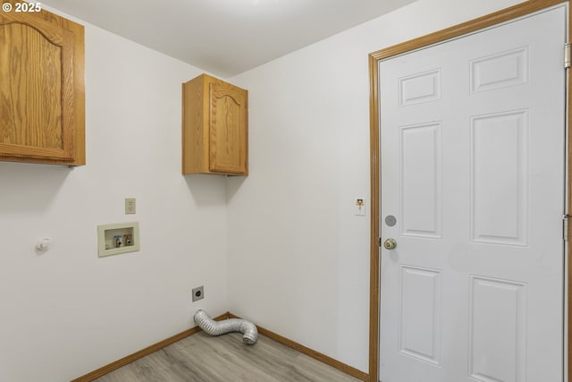 laundry room with washer hookup, cabinets, light hardwood / wood-style flooring, and hookup for an electric dryer