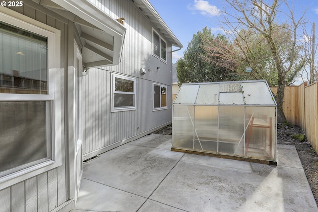 view of patio / terrace featuring an outbuilding