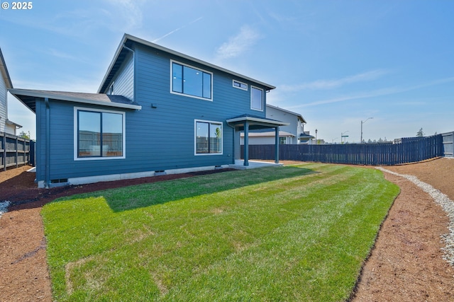 4308 N 12th Way, Ridgefield, WA 98642 - back of house with a lawn, a fenced backyard, and a patio area