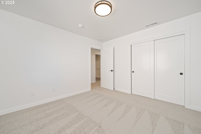 4308 N 12th Way, Ridgefield, WA 98642 - unfurnished bedroom with carpet flooring, baseboards, visible vents, and a closet