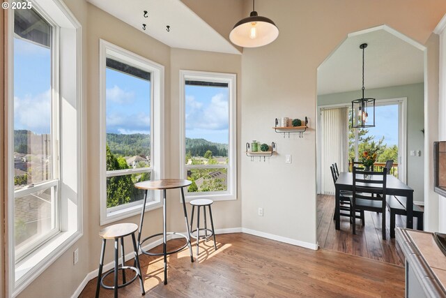 16117 SE Goosehollow Dr, Damascus, OR 97089 - dining area with dark wood-style floors and a chandelier