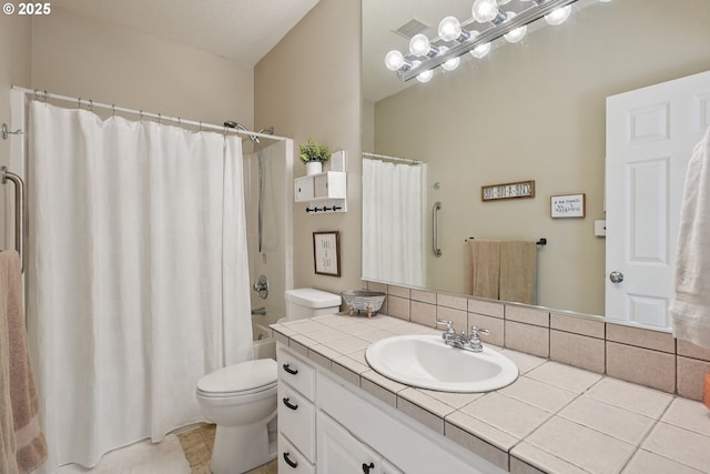 16117 SE Goosehollow Dr, Damascus, OR 97089 - full bathroom featuring vanity, shower / bath combo with shower curtain, tasteful backsplash, and tile patterned flooring