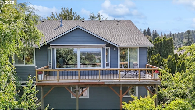 16117 SE Goosehollow Dr, Damascus, OR 97089 - rear view of house with a wooden deck and roof with shingles
