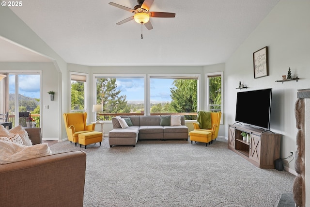 16117 SE Goosehollow Dr, Damascus, OR 97089 - carpeted living area featuring plenty of natural light, a ceiling fan, and vaulted ceiling