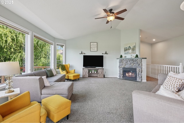 16117 SE Goosehollow Dr, Damascus, OR 97089 - carpeted living area featuring a ceiling fan, lofted ceiling, and a fireplace
