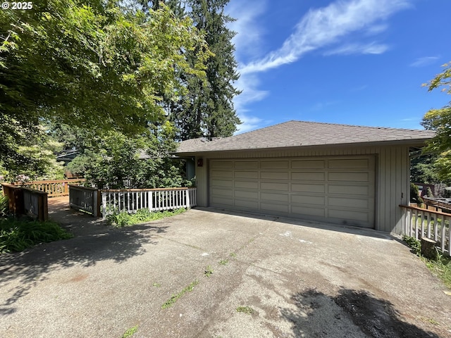 garage with fence