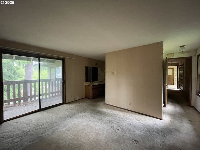 unfurnished living room with carpet floors