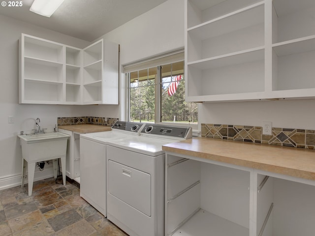17234 Oakdale Rd, Dallas, OR 97338 - clothes washing area with stone finish floor, laundry area, and washer and clothes dryer