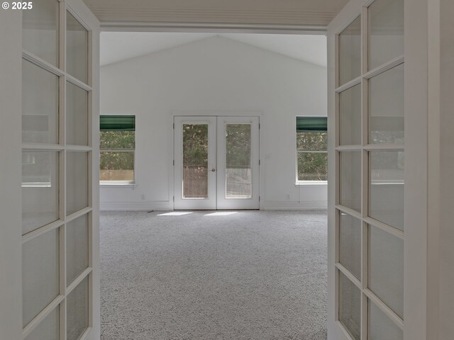 17234 Oakdale Rd, Dallas, OR 97338 - carpeted empty room with vaulted ceiling, a healthy amount of sunlight, and french doors