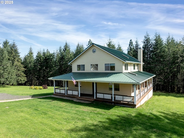 17234 Oakdale Rd, Dallas, OR 97338 - farmhouse inspired home with a porch, a front lawn, metal roof, and a chimney
